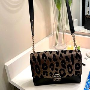 Kate spade gold and black cross body bag.